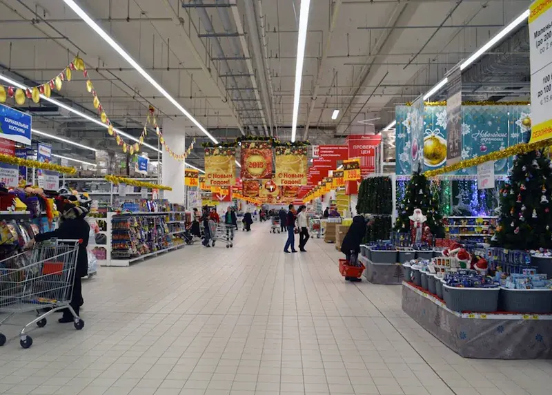 LED linear lights installed above supermarket aisles and shelves