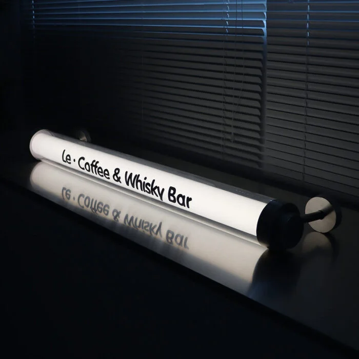 Wall mounted acrylic lightbox tube sign illuminated through 360 degrees